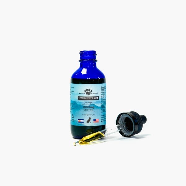 Open bottle of Earth Buddy 1000mg CBD oil for dogs with oil dropper in front. Try our full-spectrum cbd for dogs today.