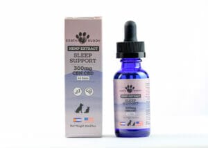 Earth Buddy Sleep Support for dogs and cats with pink box and blue bottle. CBN extract is great dog seizures and anxiety.
