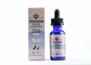 Earth Buddy Sleep Support for dogs and cats with pink box and blue bottle. CBN extract is great dog seizures and anxiety.