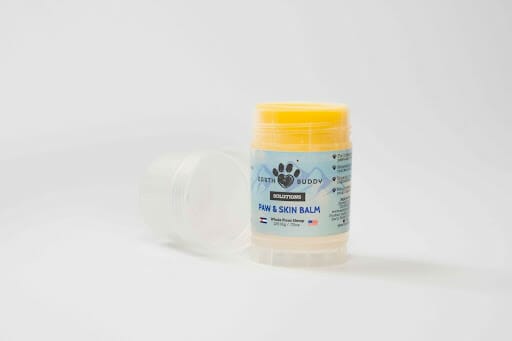 earth buddy 125mg cbd skin & paw balm for dogs in a clear container with white label. Paw & skin balm for dogs is great for dry, irritated skin. 
