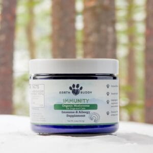 Blue jar of Earth Buddy mushroom powder for dogs contains beta-glucans to support seasonal allergies in dogs & sneezing.